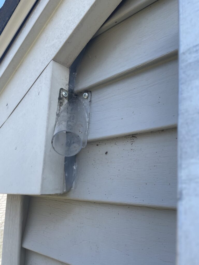 Batcone one-way door installed on soffit entry point during bat exclusion off Scott Swamp Road in Farmington CT